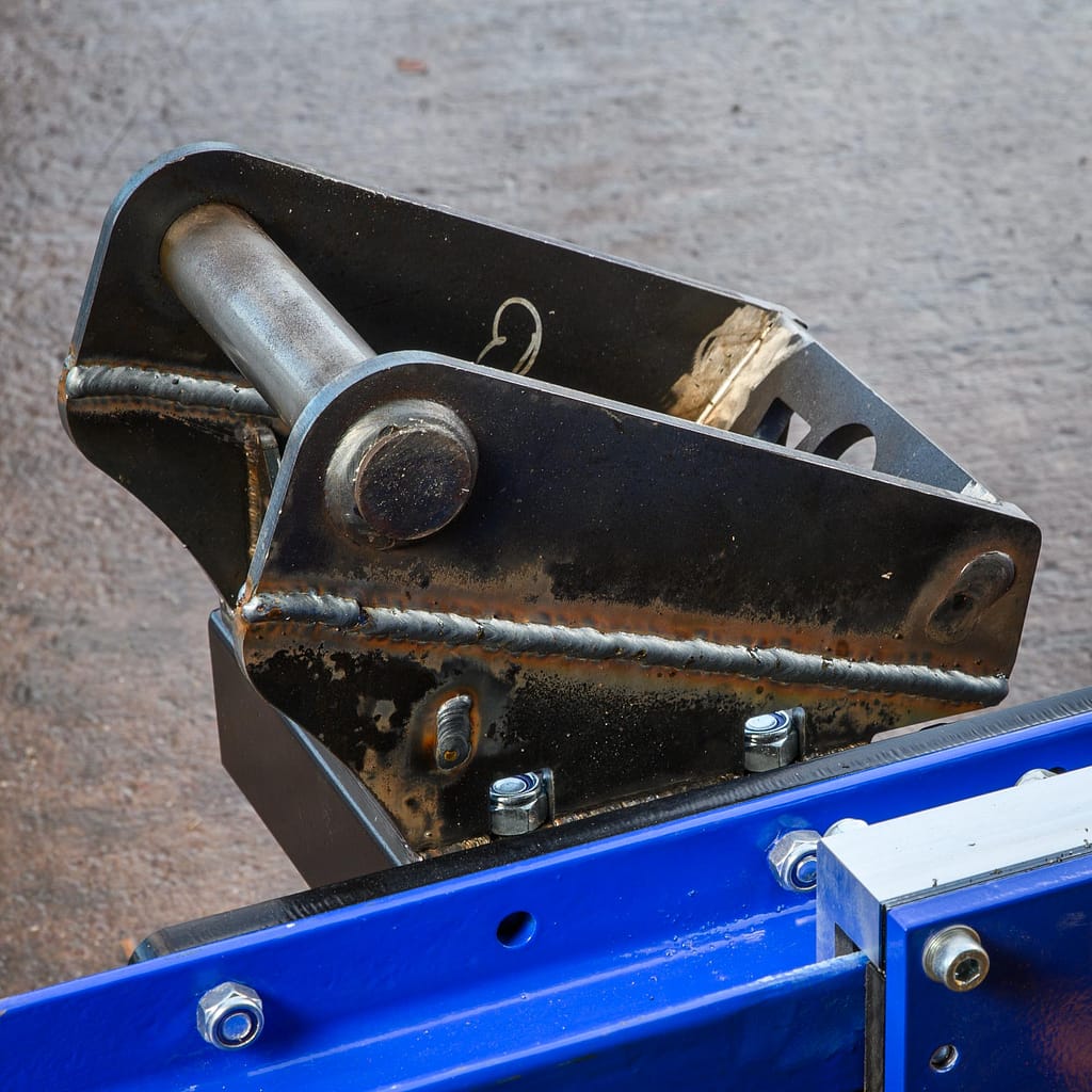 Mount point for drill mast. Attachment point for excavator.
